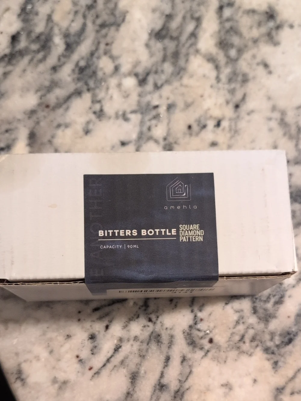 amehla Bitters Bottle - White with Black Label